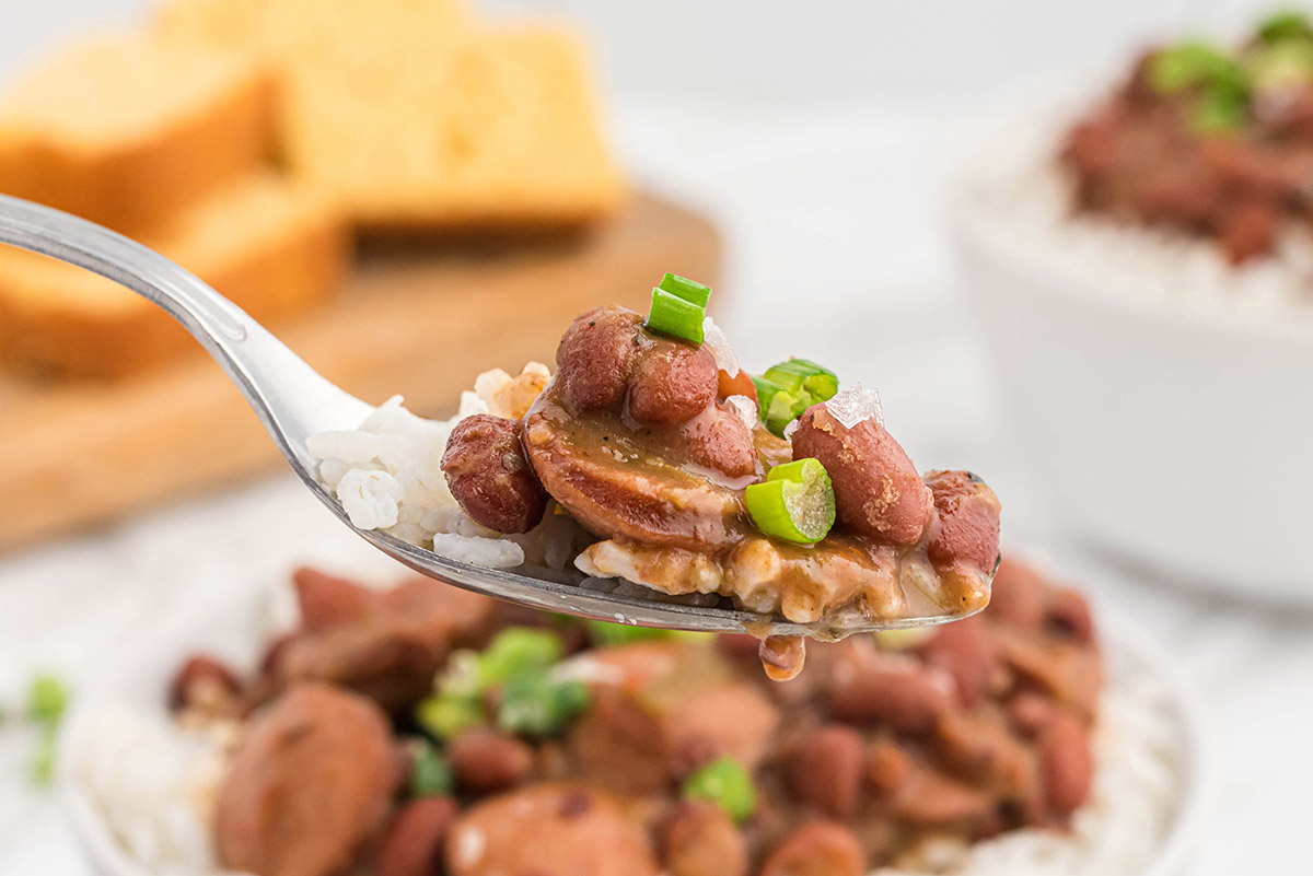 spoon holding a red bean dish