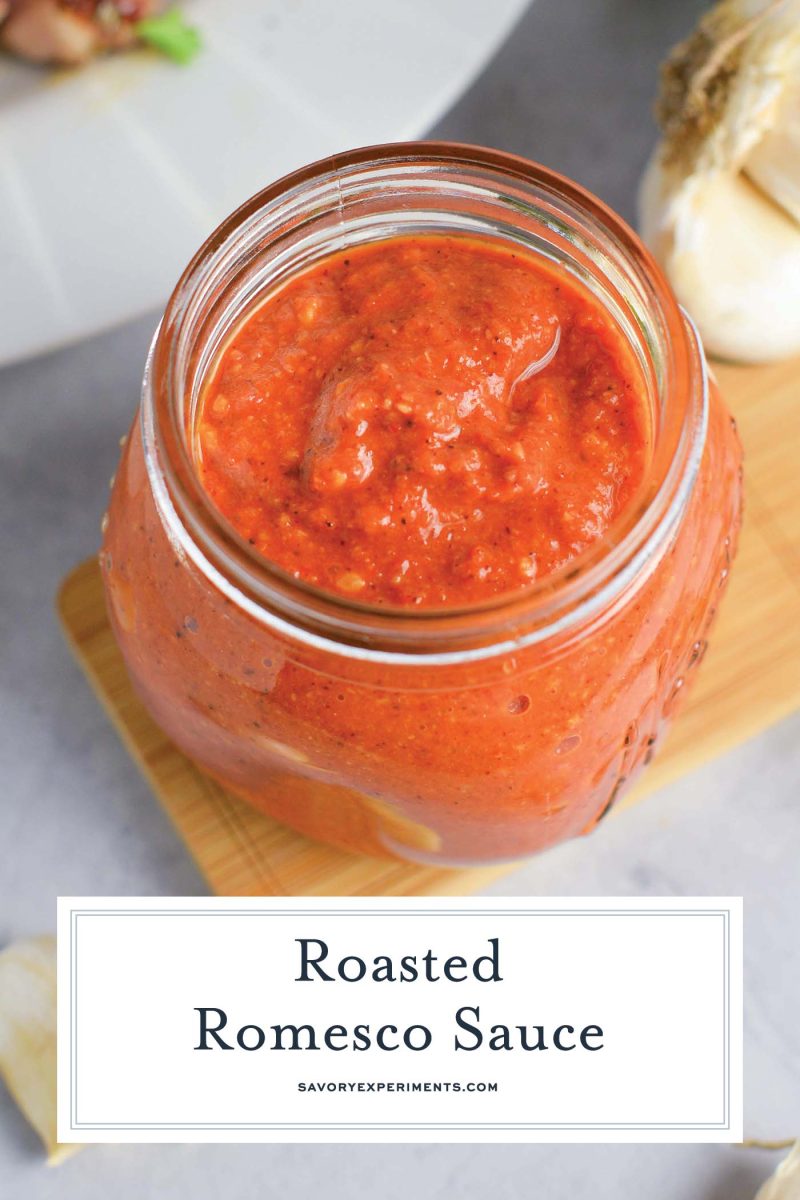 close up of romesco in a glass jar 