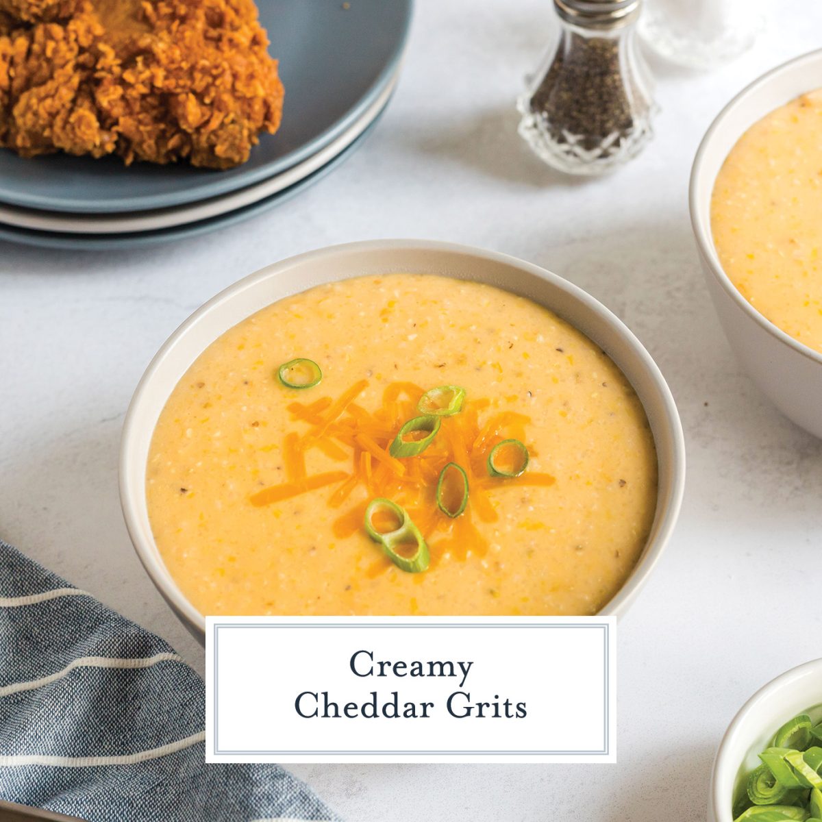 bowl of cheddar grits with text overlay for facebook