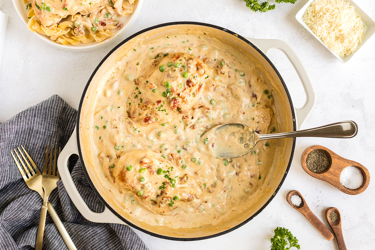 overhead shot of creamy garlic chicken in pan