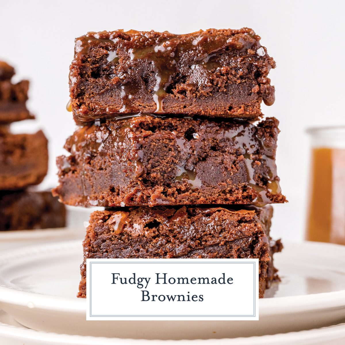 stack of fudgy brownies dripping with caramel sauce 