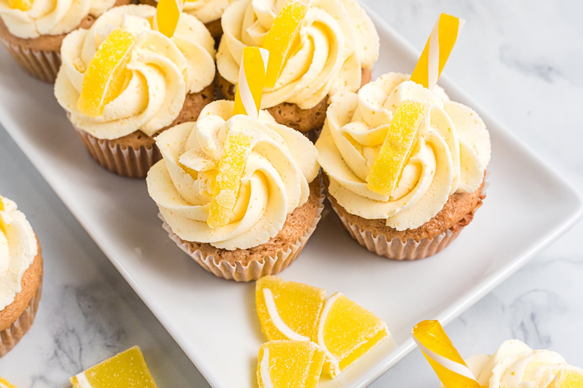 overhead shot of iced tea cupcakes on a white tray