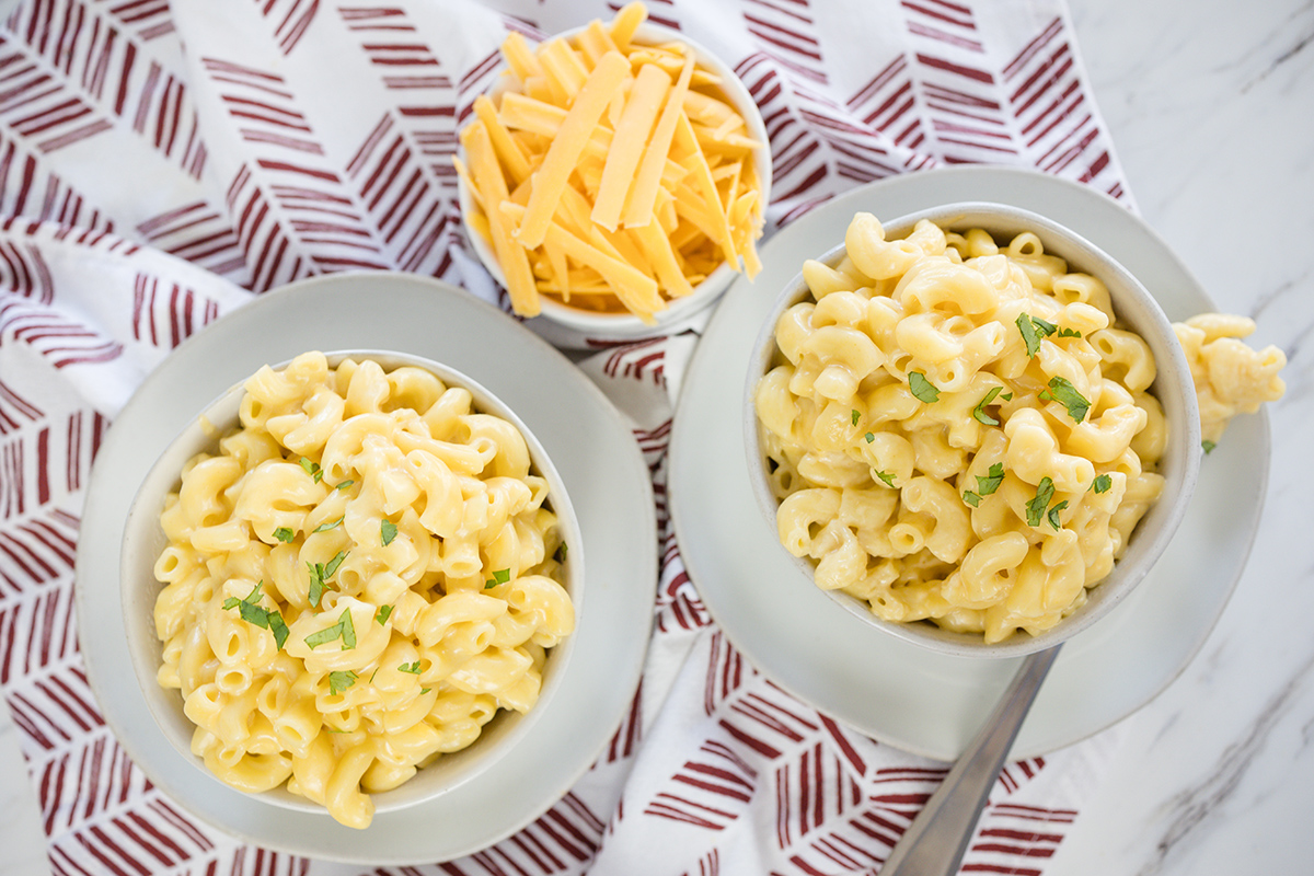 overhead shot of two bowls of instant pot mac and cheese