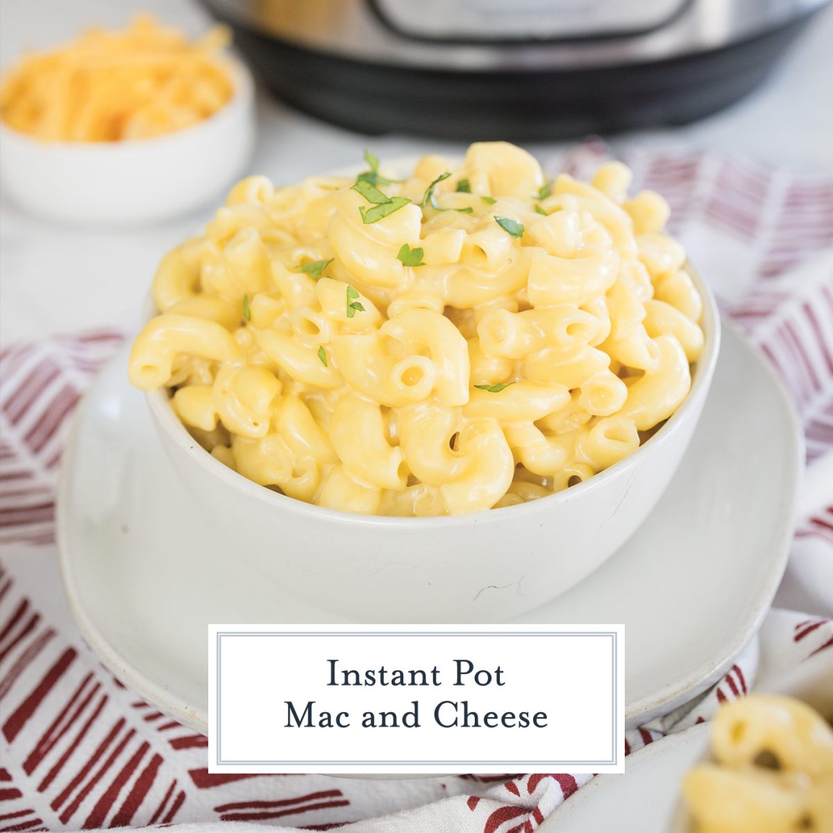 close up of bowl of instant pot mac and cheese with text overlay for facebook