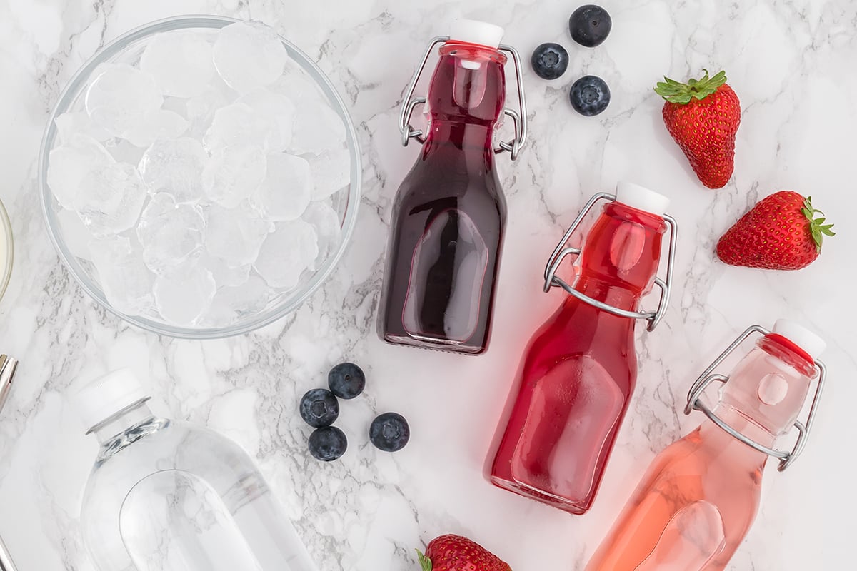 homemade simple syrups in glass jars 