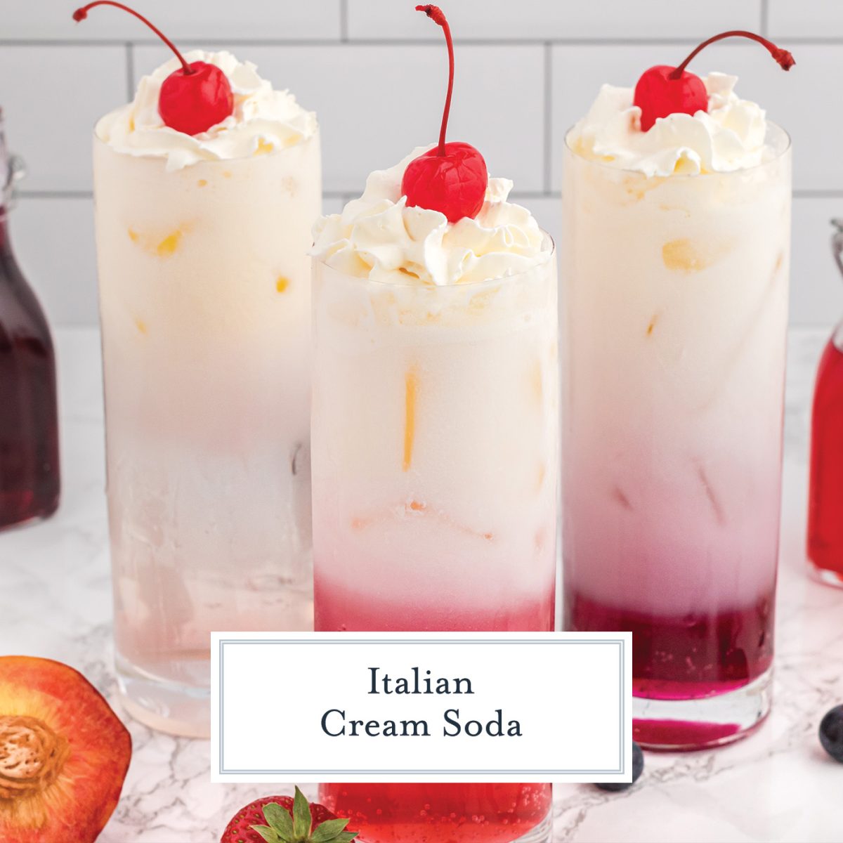 close up of homemade italian soda with whipped cream and cherries