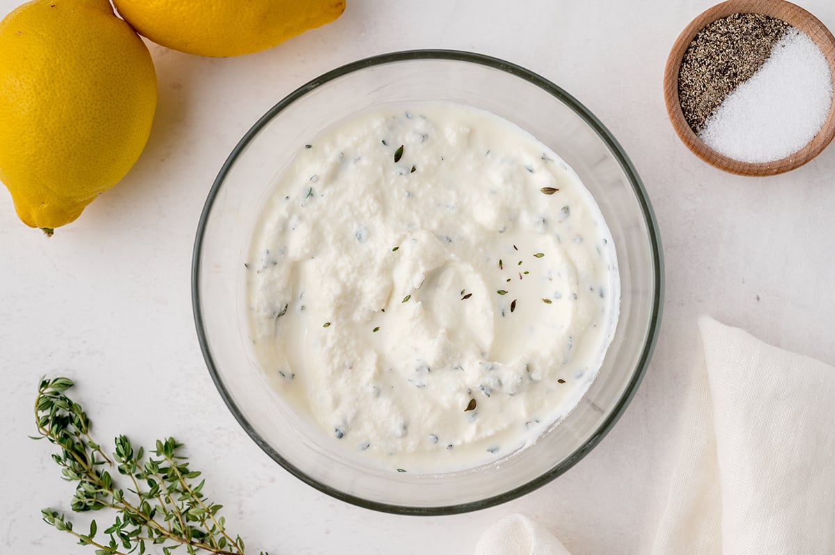 overhead bowl of ricotta lemon topping 