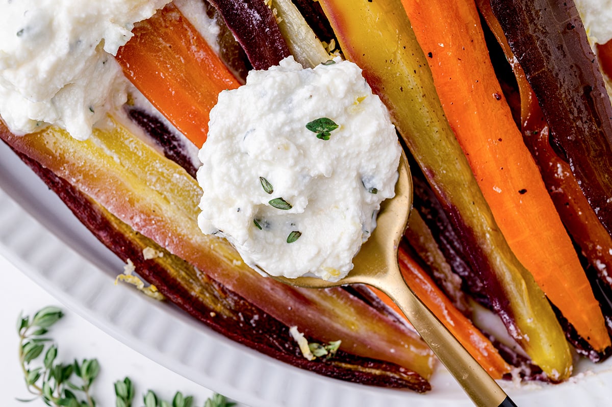 spoon placing dollops of ricotta cheese 