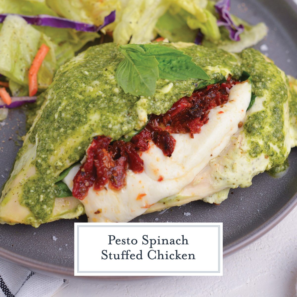 angle of chicken breast with pesto, cheese and sun dried tomatoes