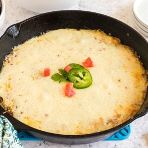 straight on shot of queso fundido in a skillet