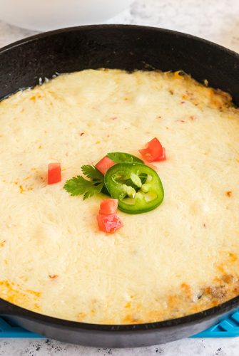 straight on shot of queso fundido in a skillet