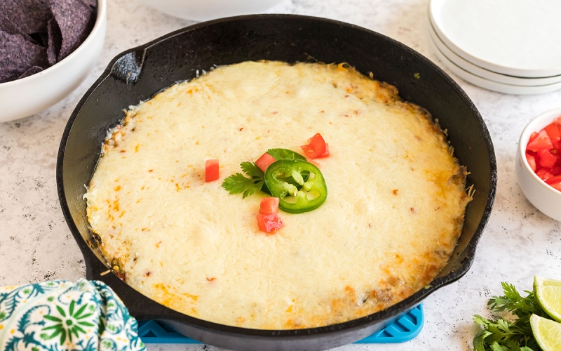 straight on shot of queso fundido in a skillet