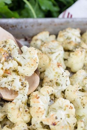 wooden spoon with roasted cauliflower