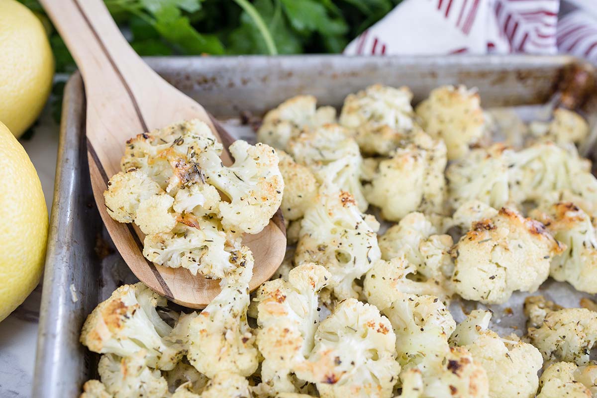 wooden spoon with roasted cauliflower