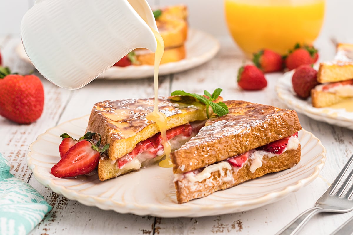 vanilla butter syrup pouring over stuffed french toast 