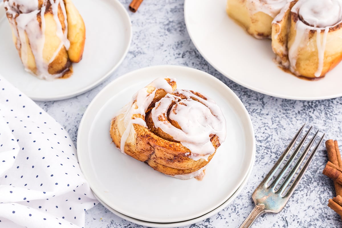 cinnamon roll on white plate