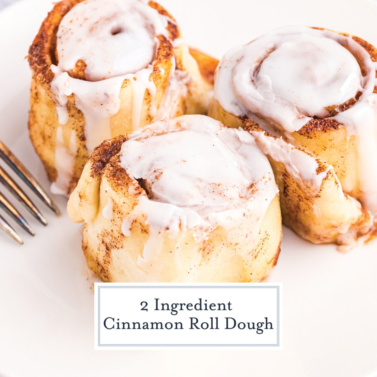 three cinnamon rolls on a plate with text overlay for facebook