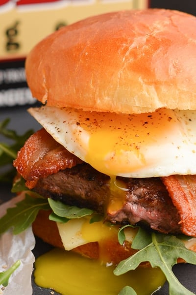 breakfast burger with a runny egg