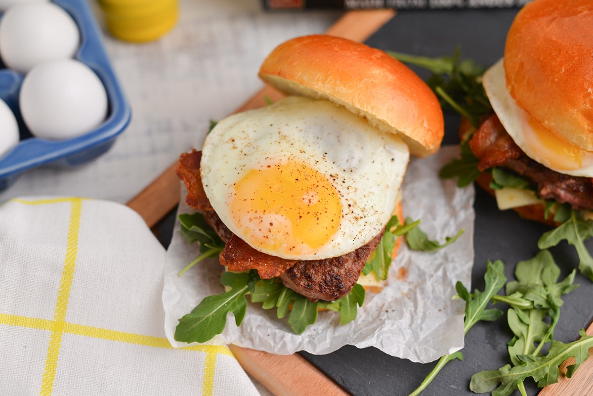 overhead burger with an egg, salt and pepper 