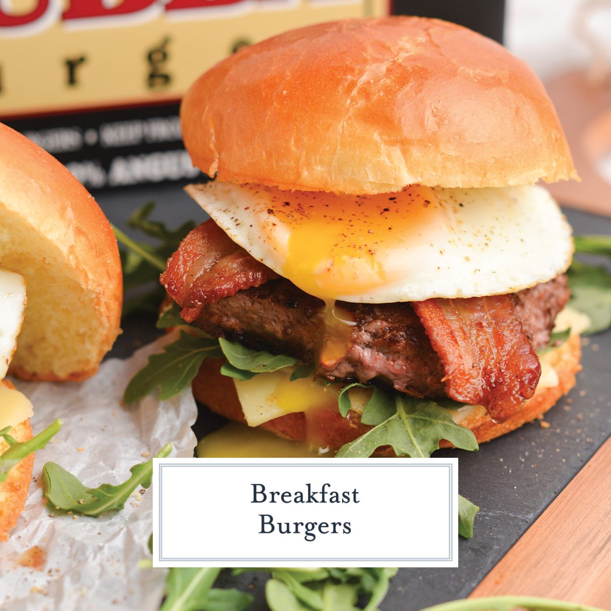 Close up of a breakfast burger with running egg and bacon 