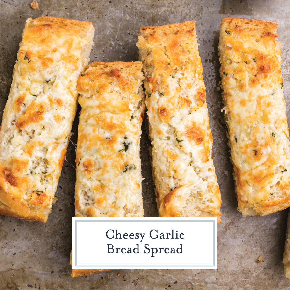 garlic bread sticks on a baking sheet 