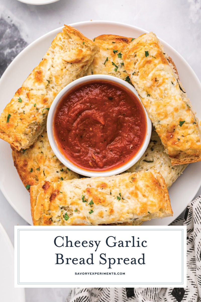 close up of bread sticks with marinara sauce 