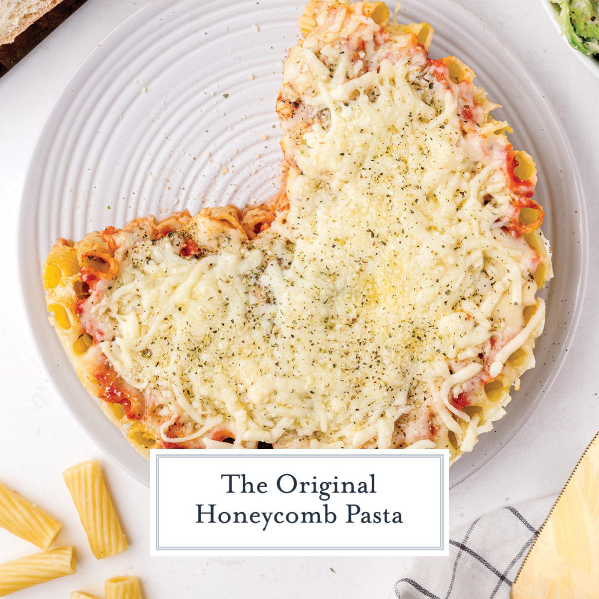 overhead of honeycomb pasta on a white plate