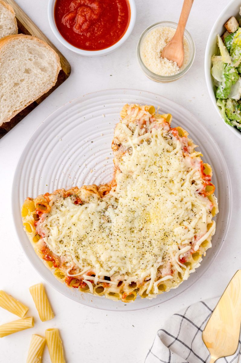 overhead of honeycomb pasta with a slice taken out