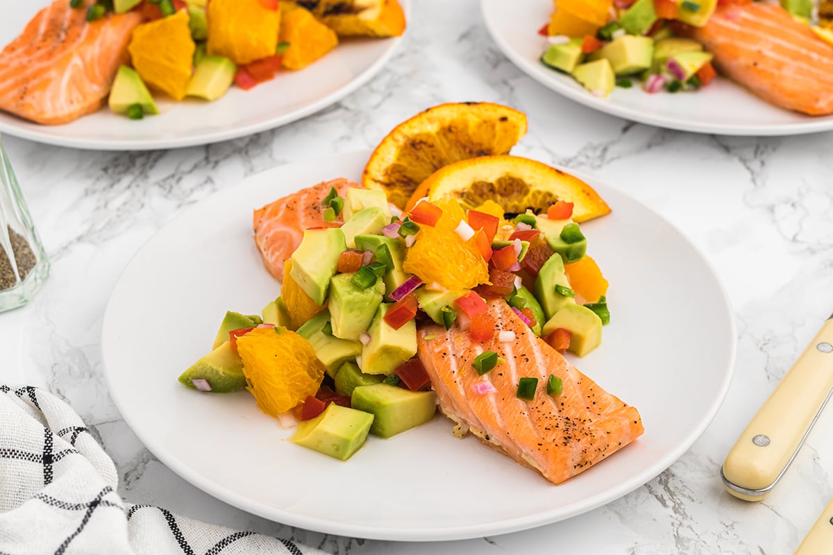 straight on shot of maple citrus salmon on a plate