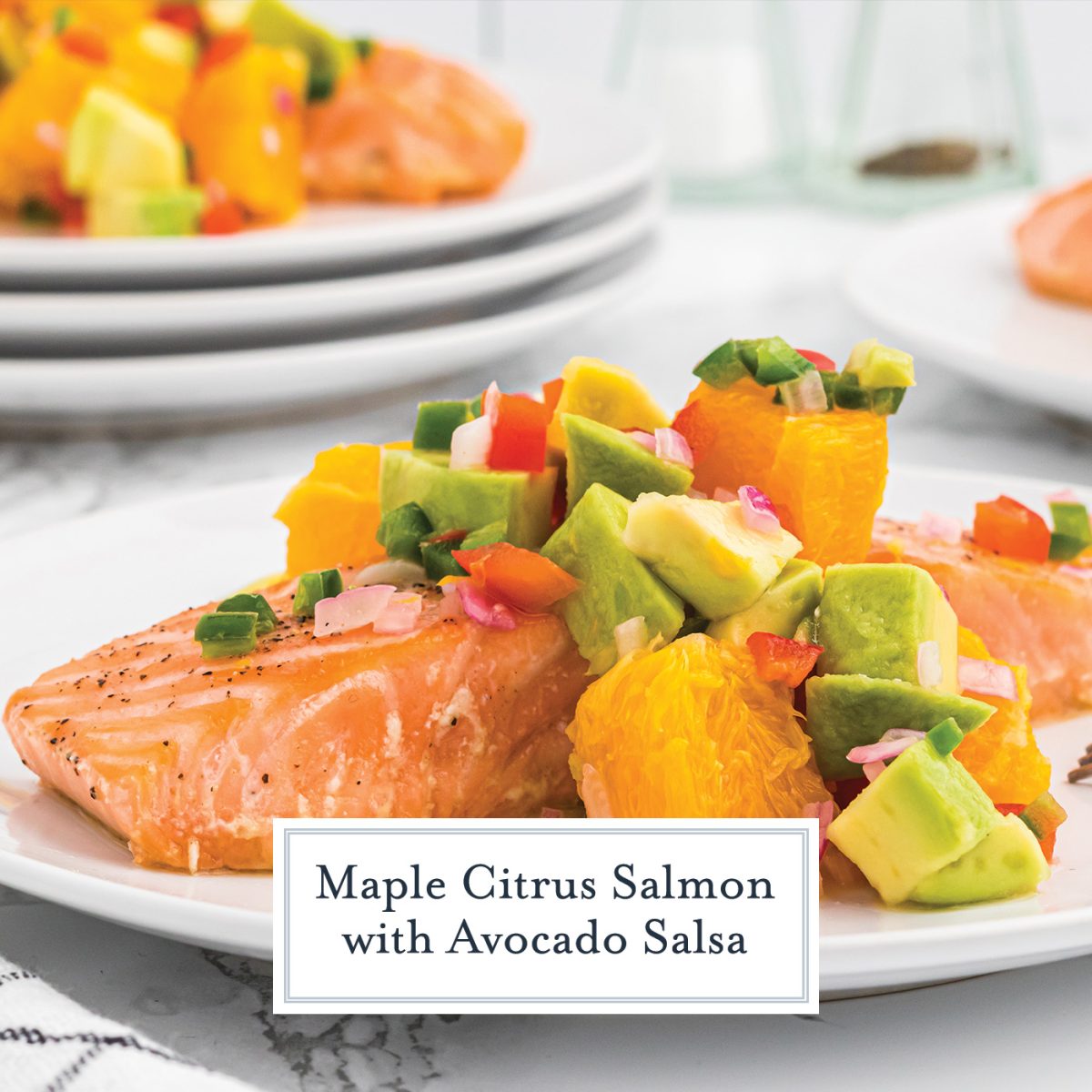 citrus salmon on a plate with text overlay for facebook