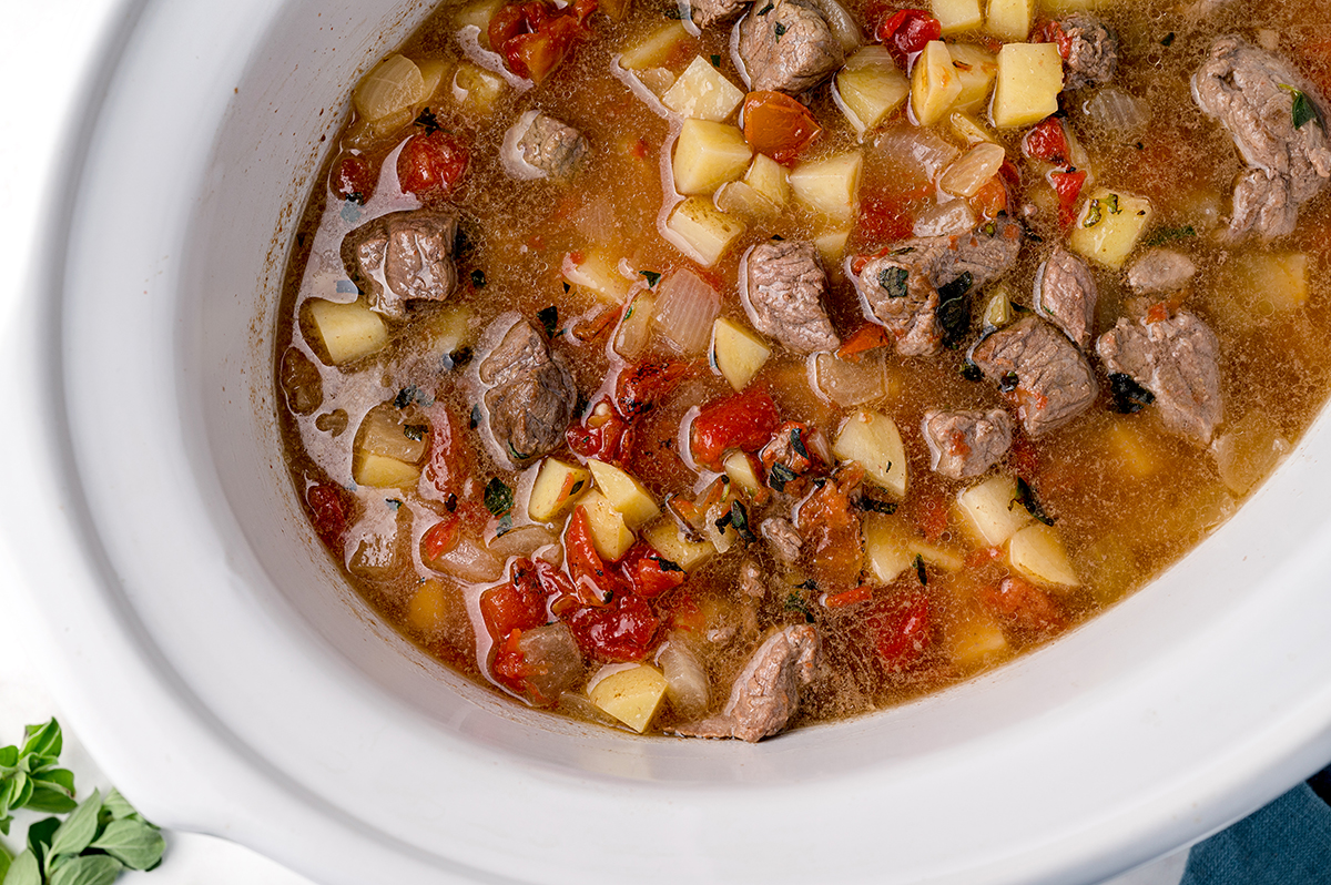 overhead shot of beef stew in slow cooker