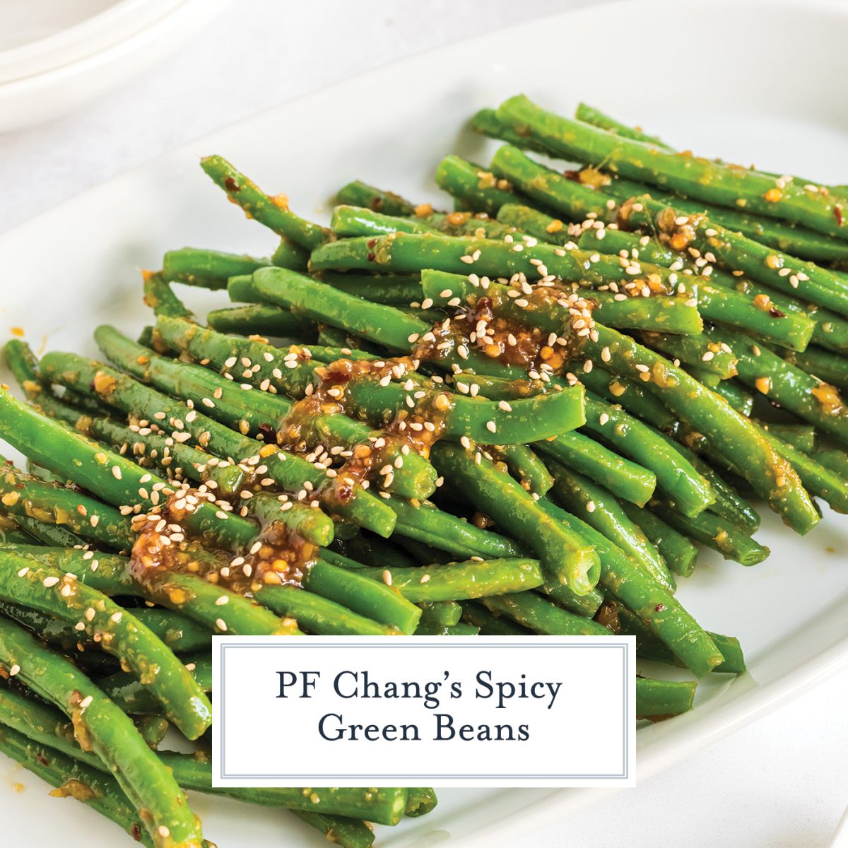 close up of spicy green beans on a plate