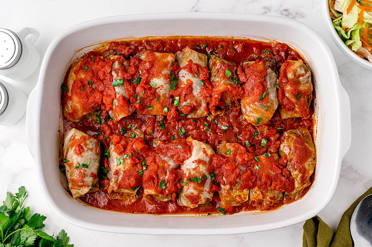 overhead shot of baking dish full of cabbage rolls