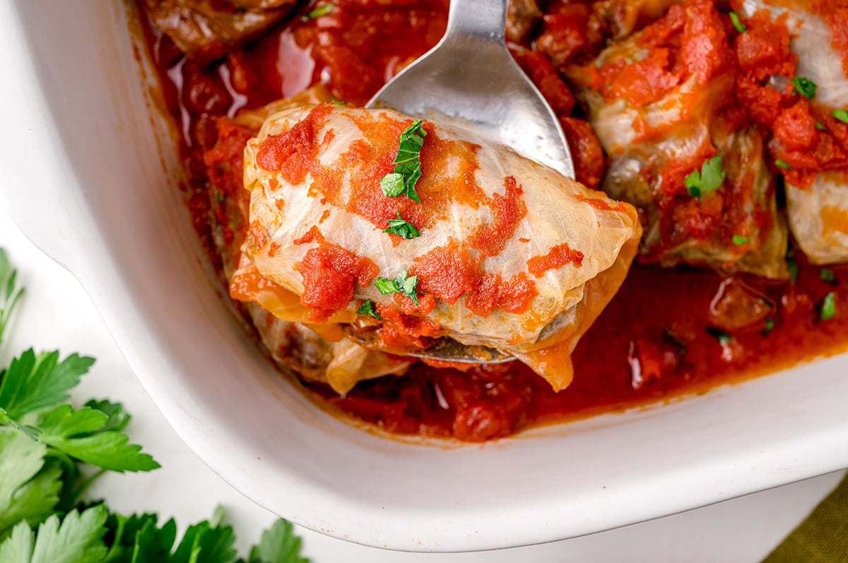 overhead shot of cabbage roll on a serving spoon