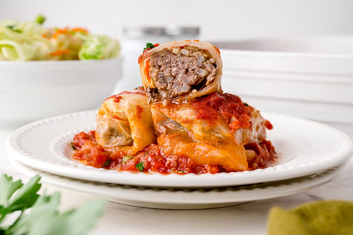 half a cabbage roll stacked on two cabbage rolls