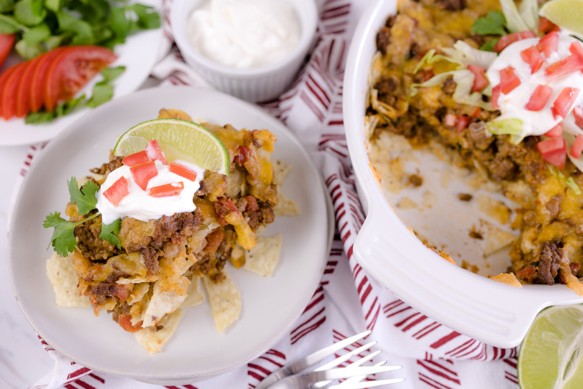 taco bake casserole being served  