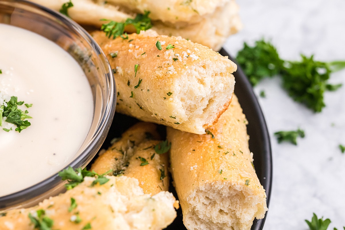 inside shot of a breadstick showing how fluffy the bread is