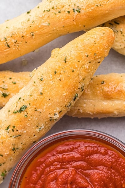 close up of garlic breadsticks