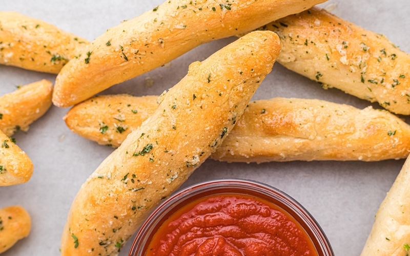 close up of garlic breadsticks