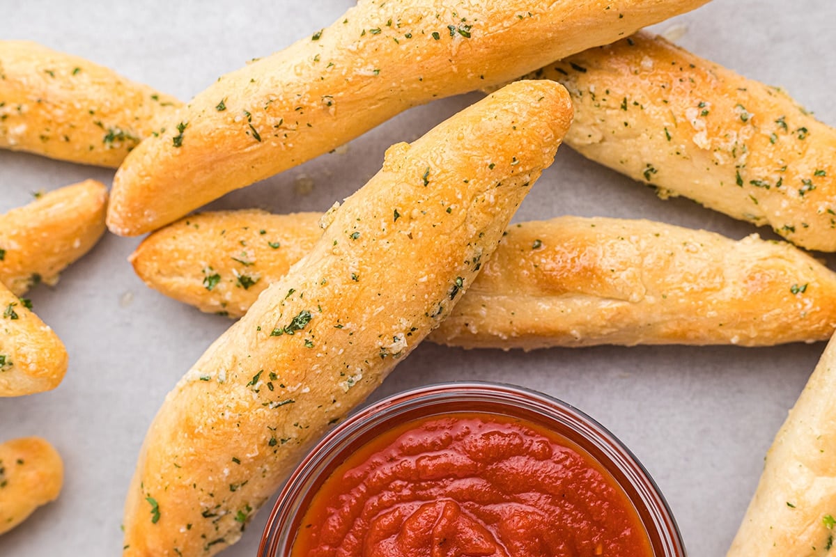 close up of garlic breadsticks