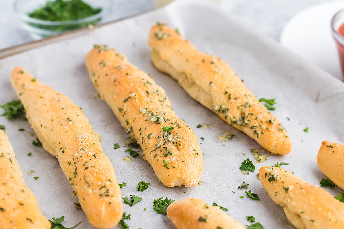 breadsticks on a baking sheet
