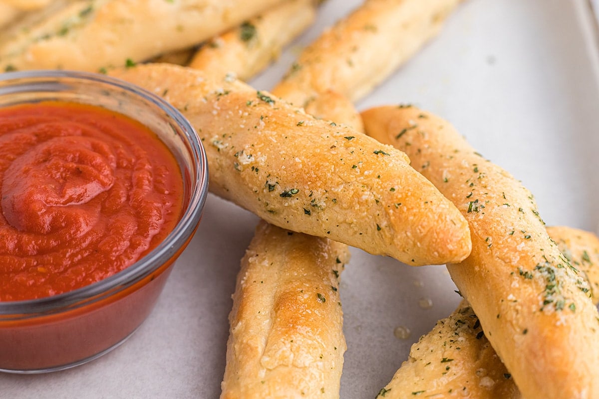 angle view of breadsticks stacked on each other
