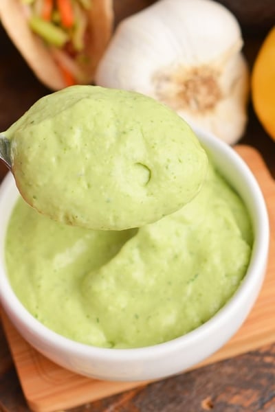 spoon holding green goddess dressing