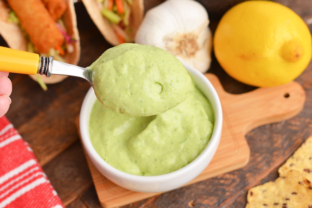 spoon holding green goddess dressing