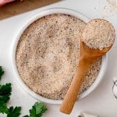 bowl of steak seasoning with wooden spoon