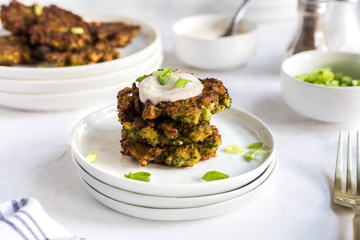 straight on shot of stack of broccoli fritters