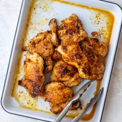 chicken thighs on baking tray