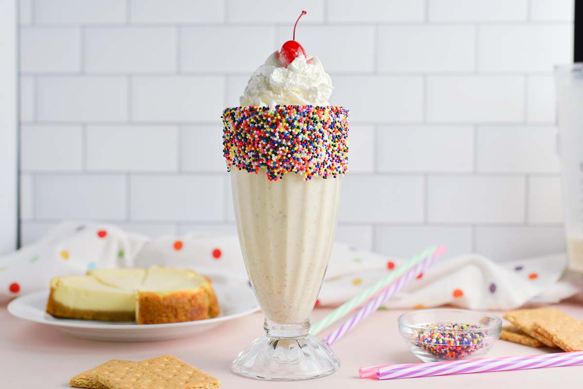 milkshake with sprinkled rim in a malt glass 