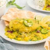 angled shot of plate of coconut chicken curry