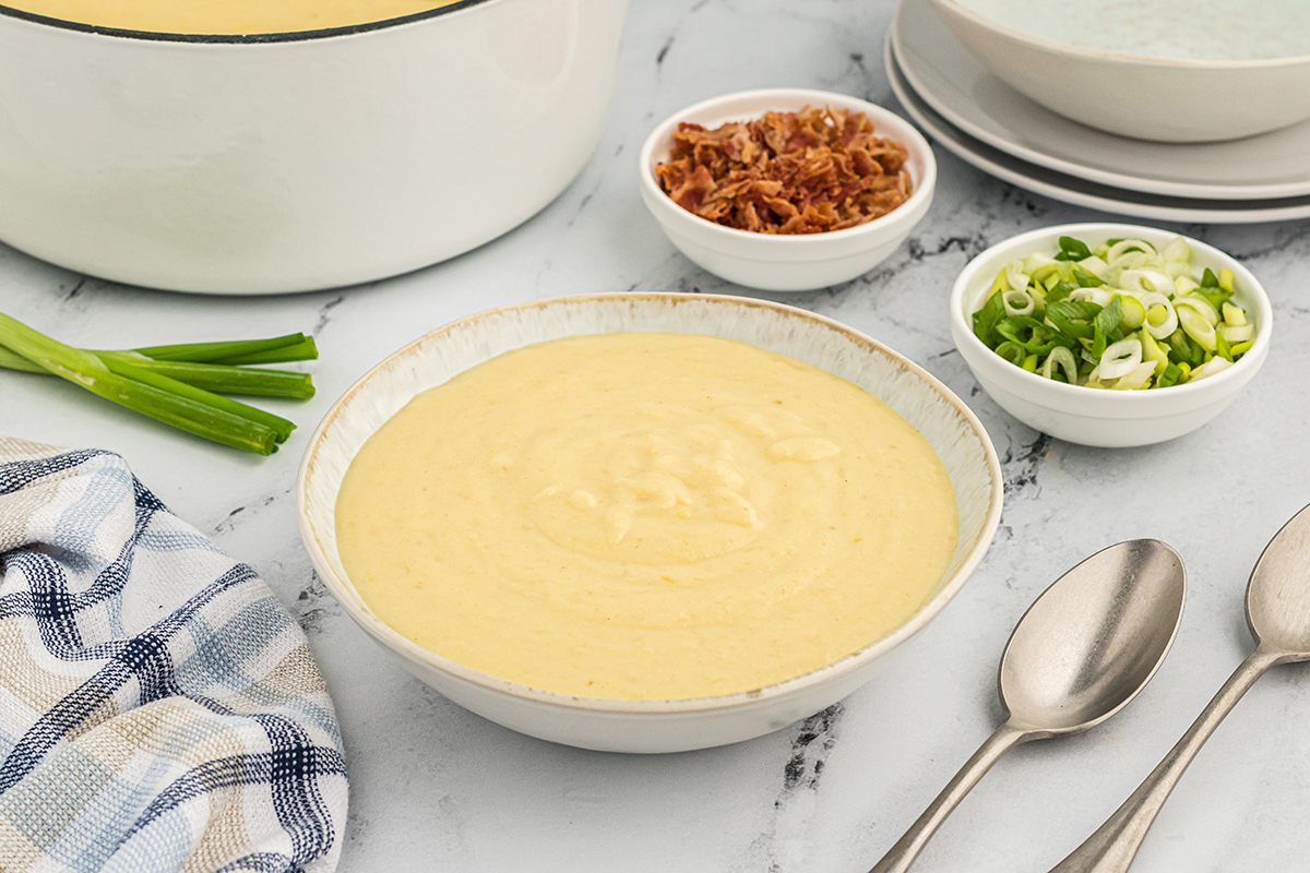 angled shot of bowl of leek and potato soup